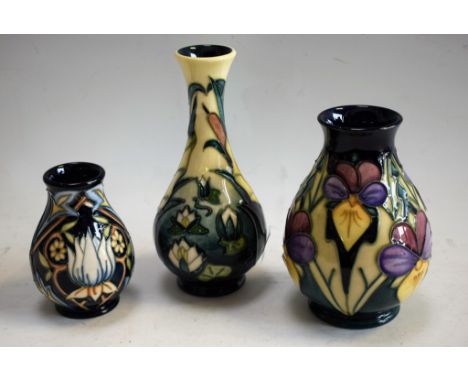 Ceramics - a Moorcroft Viola pattern baluster vase, signed to the base, dated 1994, J Moorcroft, approx 14cm in height; anoth