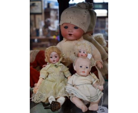 Dolls - a Johann Walther &amp; Sohn porcelain socket head doll, fixed eyes, open mouth with teeth, blond wig, composite body 