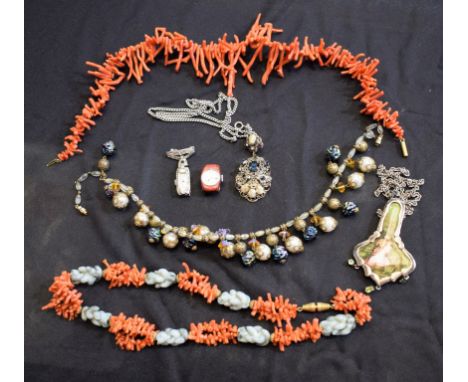 A graduated coral necklace; another coral and jadeite necklace; a 1930s marcasite cocktail style nurse's watch; a Murano glas