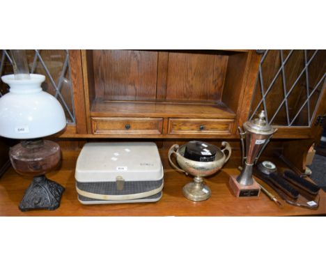 An Edward VII cast iron oil lamp, peach glass reservoir, white shade; EPNS trophy; Grundig TK18, Reel to Reel; etc