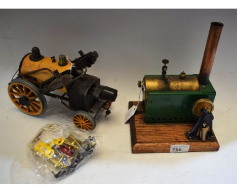 A stationary steam engine; a working model of a rocket (a/f); Meccano gears (3)