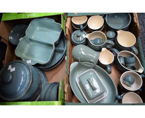 Ceramics - a Denby dinner service including dinner plates, side plates, cups, saucers bowls covered serving bowl, jugs, cruet