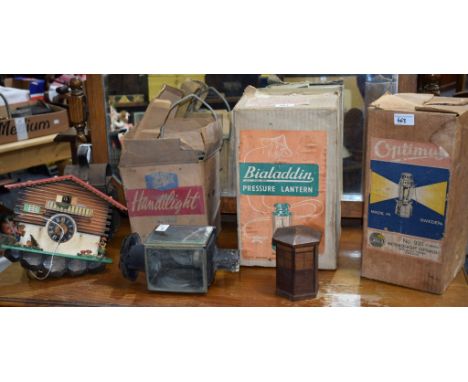 Boxes and Objects - a Bialaddin pressure lamp, boxed; another, Optimus; a carriage lamp; a cuckoo clock; etc