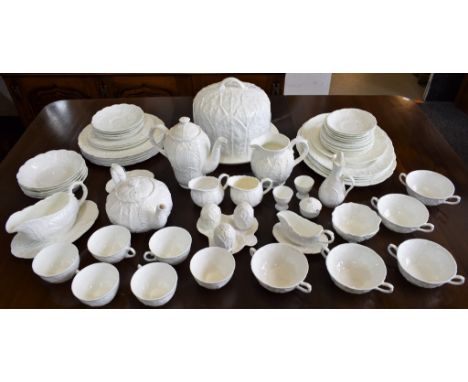 Ceramics - a Coalport Countryware cabbage leaf dinner service, plain white, including dinner plates, side plates, cups and sa