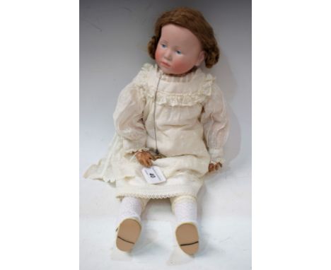A Kammer &amp; Reinhardt 101 bisque head character doll, 'Marie', c.1910, with very fine pale bisque head, painted pale blue 