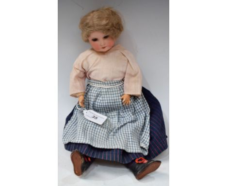 An Armand Marseille 390 bisque socket head doll , sleeping brown eyes, open mouth with teeth, mid length light brown hair, co