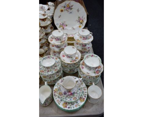 A Royal Crown Derby Posies pattern part dinner and tea service, comprising dinner plates, dessert plates, side plates, cups a