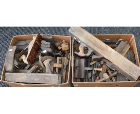 A quantity of 19th century and later wooden carpentry planes, various sizes; other wood working tools