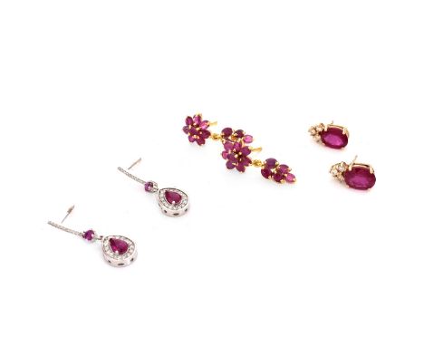Collection of Three Delicate Ruby Earrings. Unsigned. Rubies with vivid color. Largest pair measures 1" L, 1/2" W. Approx. we