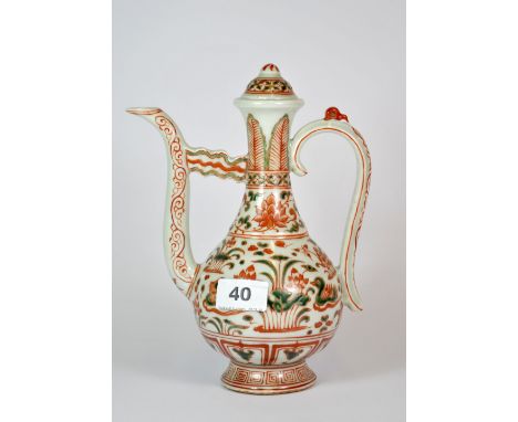 A Chinese porcelain wine ewer with over-glaze red and green enamel decoration, H. 23cm.