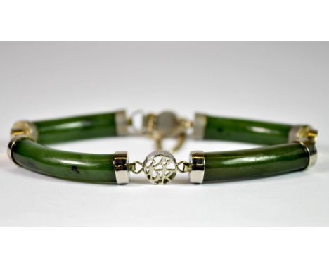 A Chinese white metal and jade bracelet.