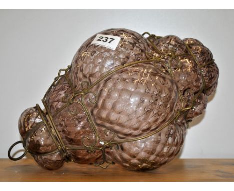 An amethyst glass hanging lamp, H. 34cm.