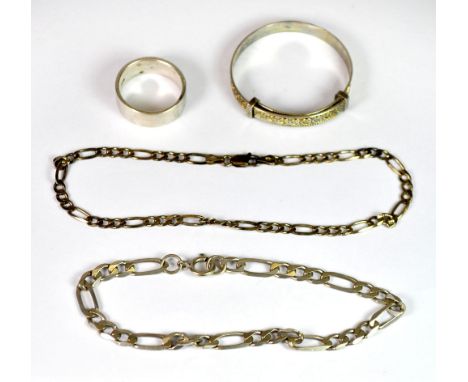 Two silver bracelets, a baby bangle and a ring.