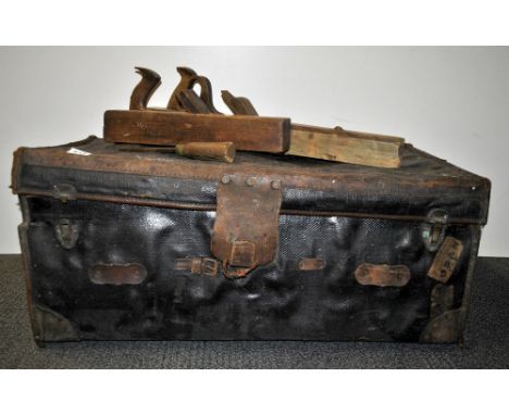 A vintage trunk full of tools.