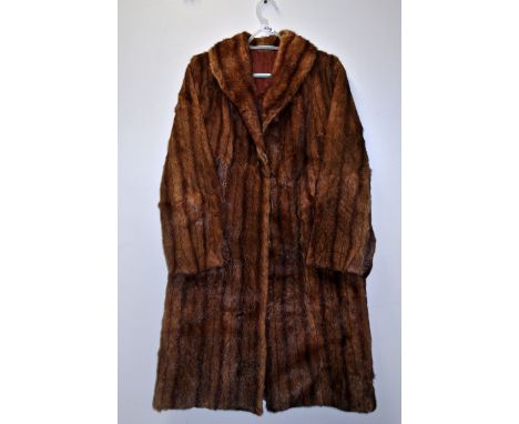 A vintage ladies red mink coat.