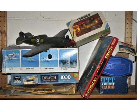 A mixed quantity of vintage toys and models.