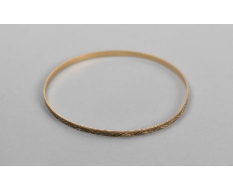 A 9ct Gold Bangle, 3.9g 
