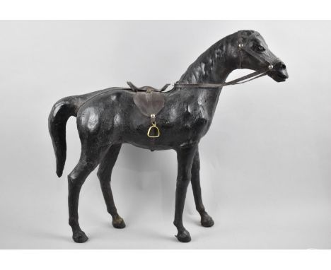 A Mid 20th Century Spanish Model of a Horse with Saddle and Bridle, 38cm high, Missing Ears 