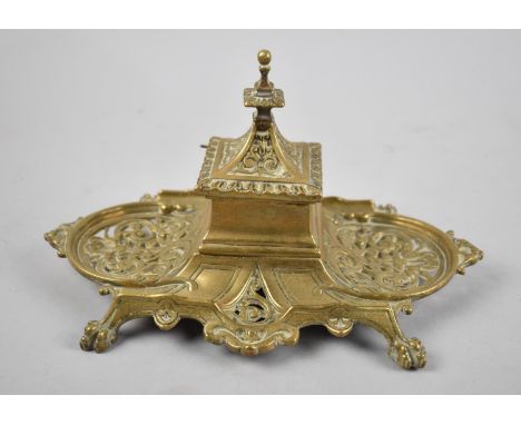 A French Style Brass Desktop Inkwell, Missing Liner, Four Claw Feet and Two Pen Rests, 24cm Wide 