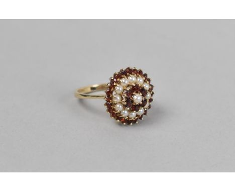 A 9ct Gold Ladies Dress Ring with Garnet and Pearl Cluster, Size O, 3.56g 