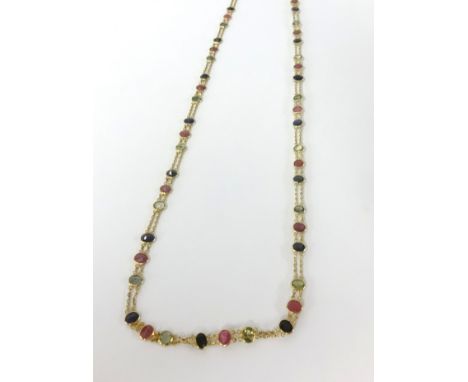 An 18ct yellow gold and multi stone necklace, approx 10.9gms.