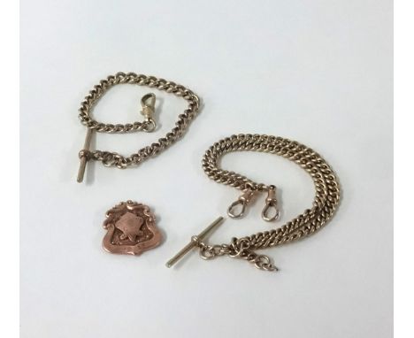 A 9ct albert chain together with another and a gold pendant, approx 33gms.