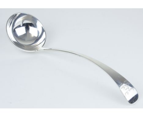 A Geo V silver ladle marked 'GJGF', approx 9oz, with inscription.