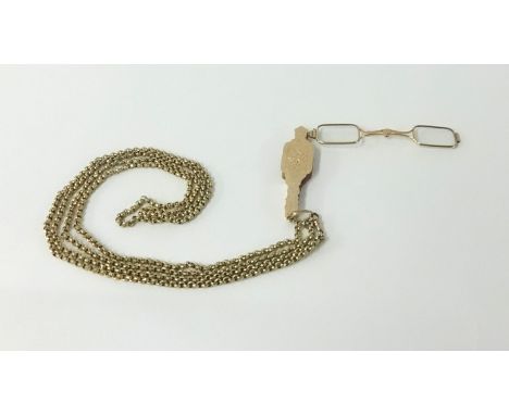 A 9ct gold chain, approx 21gms and a pair of gold lunettes.