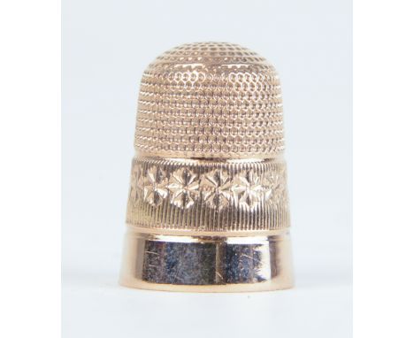 A 9ct gold thimble, maker 'CH', 5.20gms.
