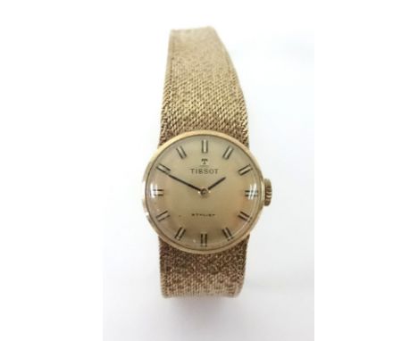 Tissot, a 9ct ladies bracelet watch the dial marked 'Stylist', approx 20.6gms.