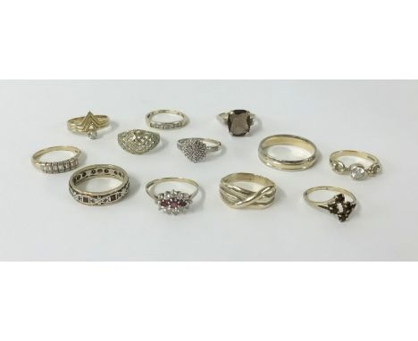 Twelve 9ct gold dress rings, approx 30gms.
