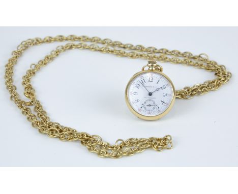 An 18ct Tiffany and Co open face fob watch with a Longines movement, enamelled dial, the back plate marked 18k', 'Made for Ti