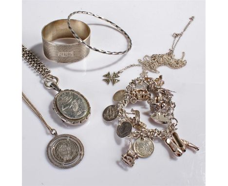 Mixed lot of silver jewellery to include, a silver charm bracelet, a silver bangle, a silver coin pendant on chain, a silver 