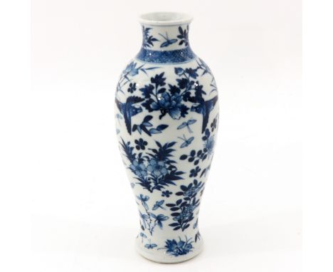 Depicting flowers, birds, and butterflies, Kangxi mark, 29 cm. tall.