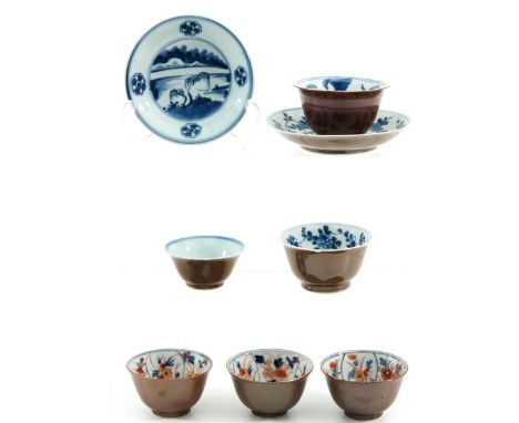 Including 6 cups and 2 saucers, largest saucer is 12 cm. in diameter, chip and hairline.