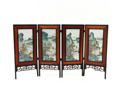 Depicting landscape scenes in Famille Rose enamels, 56 x 32 cm. when open,&nbsp;small piece of wood missing on frame, one til