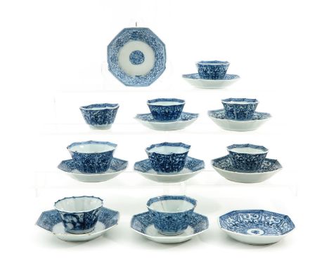 Including 10 saucers and 9 cups in blue and white decor, saucers are 10 cm. in diameter, chip and hairline.