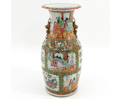 Decorated with scenes of gathering of Chinese figures, flowers and butterflies, temple lion handles, 46 cm. tall. 