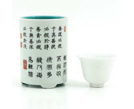 Brush pot decorated with Chinese text and seal marks with Qianlong mark 11 cm. tall, cup decorated with bird of paradise.