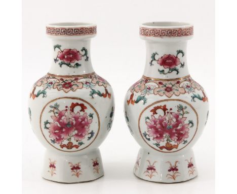Decorated with flowers, Kangxi mark, 19 cm. tall. chip.