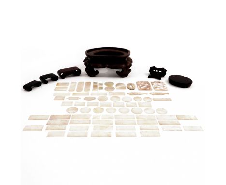 Including mother of pearl and carved wood stands.