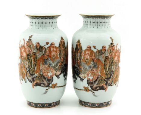 Polychrome and gilt enamels, 2 sides decorated with Chinese figures and Chinese text with seal mark, 33 cm. tall.