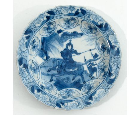 Kangxi Period, depicting Chinese figure on horseback, 11 cm. in diameter, chip.