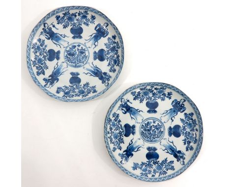 Decorated with alternating Chinese ladies and flowers in vases, Kangxi mark, 25 cm. in diameter.