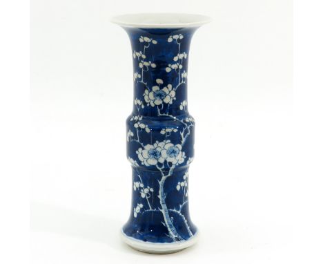 Dark blue ground with white flower blossom decor, Kangxi mark, 26 cm. tall. 