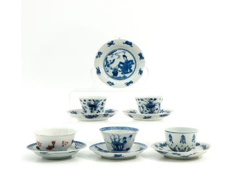 Including 5 cups and 6 saucers, in diverse decors and sizes, largest saucer is 11 cm. in diameter, chip and hairline.