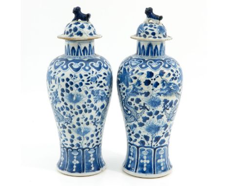 Depicting dragons and flowers, Kangxi mark, 34 cm. tall, on vase is restored.