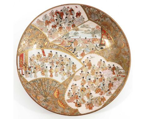 Decorated with diverse scenes of figures in garden with floral and butterfly ground, 33 cm. in diameter, hairline in glaze.