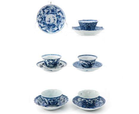 Including 5 cups and 6 saucers in blue and white decors, largest saucer is 11 cm. in diameter, chip and hairline.