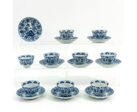 Blue and white decor depicting peach trees with butterfly, Kangxi mark, 13 cm. in diameter, hairline.